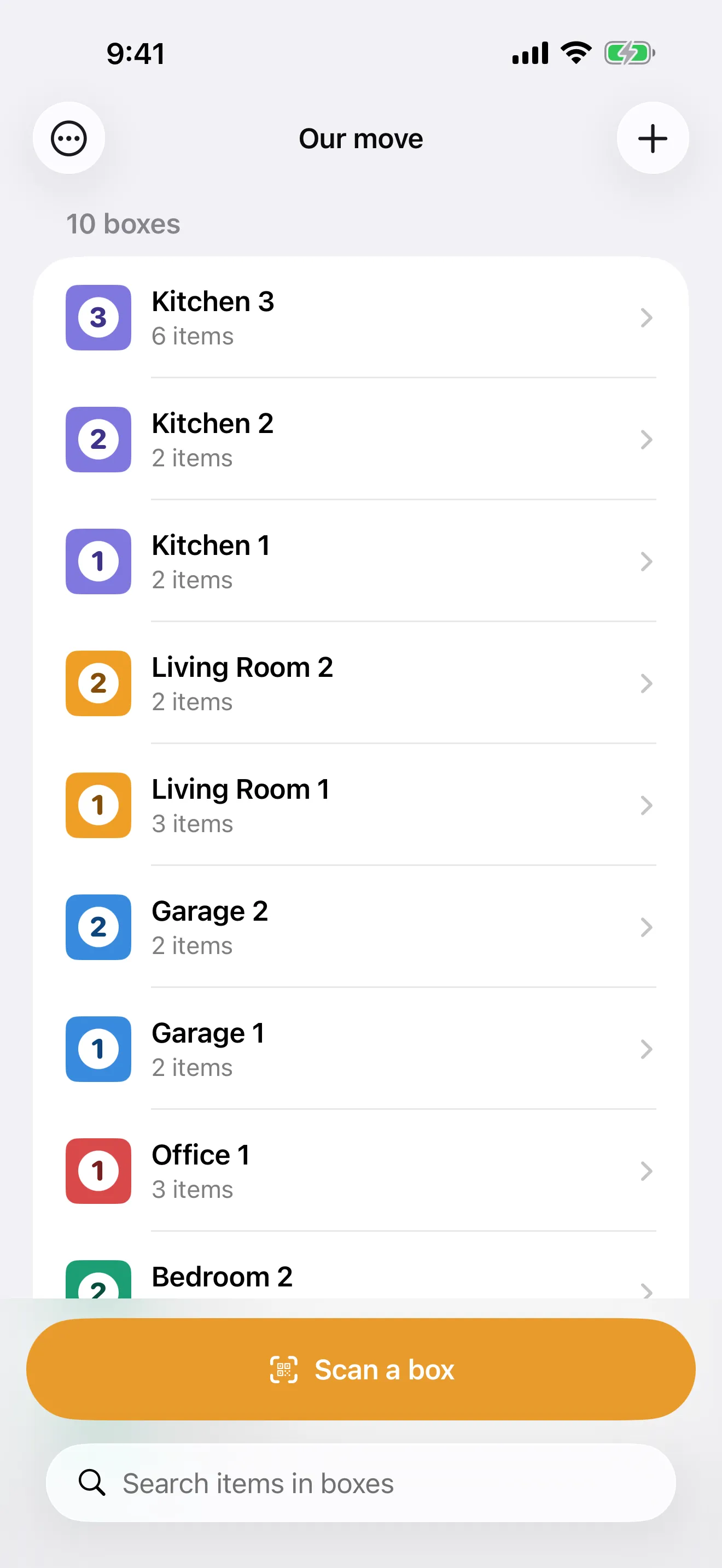 The Packmap home screen listing moving boxes with color-coded badges